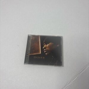 Usher CD with Blue and Gold Artwork